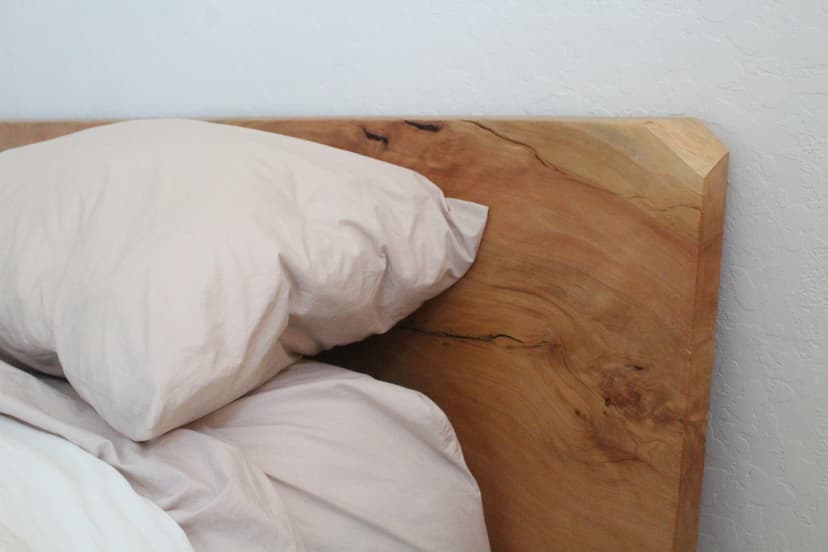 Headboard detail on an Alligator Juniper bed finished with Cactus Wax Traditional